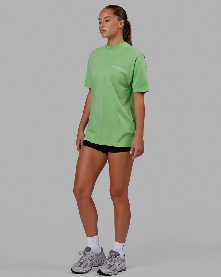 Woman wearing Unisex Motion FLXCotton Tee Oversize - Apple Mint