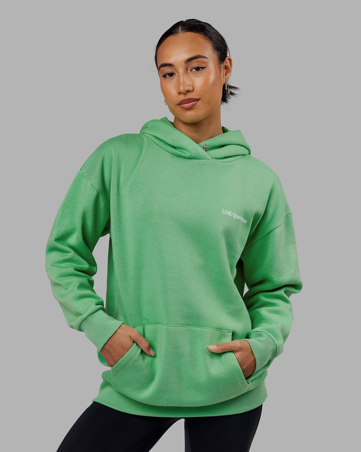 Woman wearing Unisex Motion Hoodie Oversize - Apple Mint