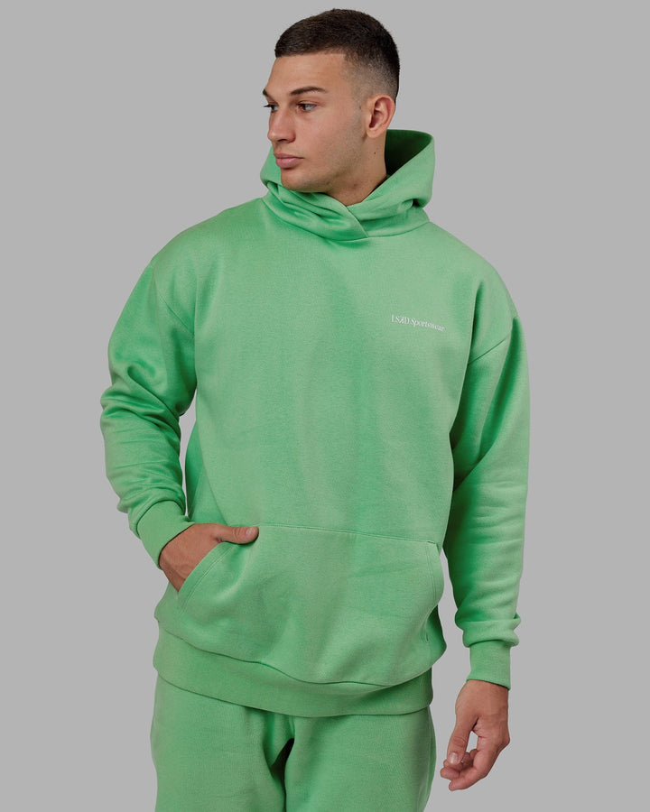Man wearing Unisex Motion Hoodie Oversize - Apple Mint