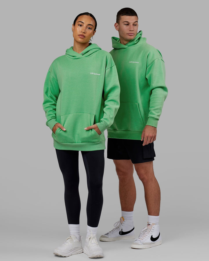 Man and Woman wearing Unisex Motion Hoodie Oversize - Apple Mint