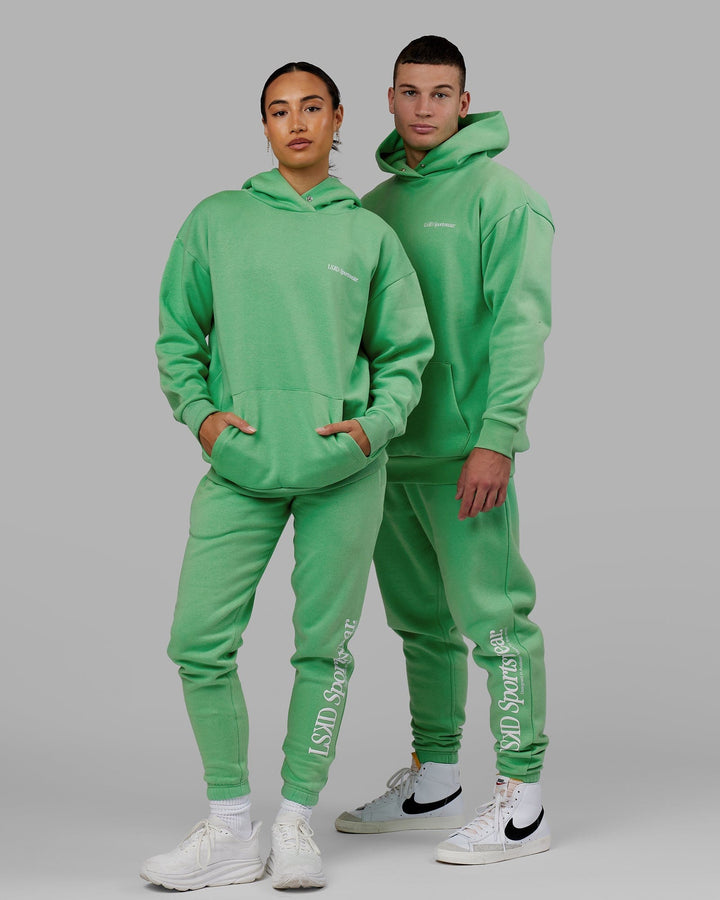 Man and Woman wearing Unisex Motion Hoodie Oversize - Apple Mint