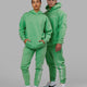 Man and Woman wearing Unisex Motion Hoodie Oversize - Apple Mint