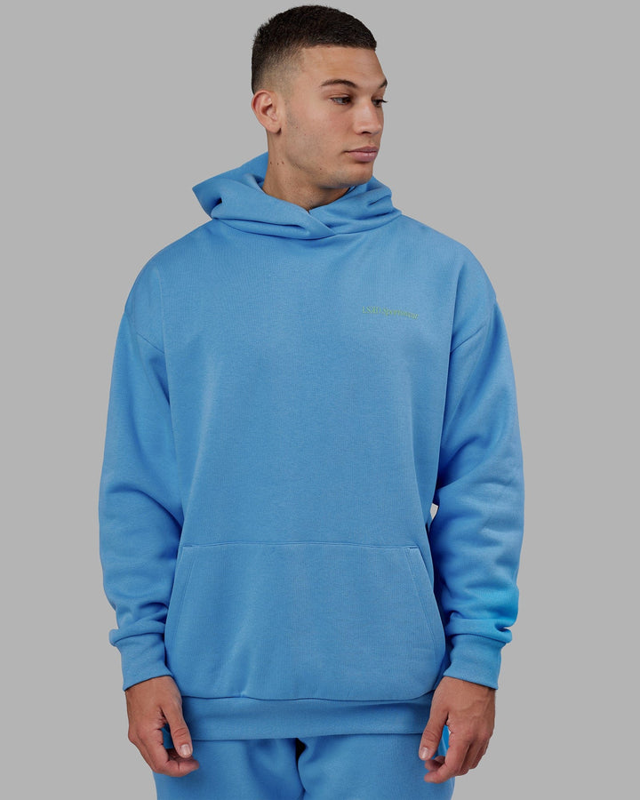 Man wearing Unisex Motion Hoodie Oversize - Azure Blue