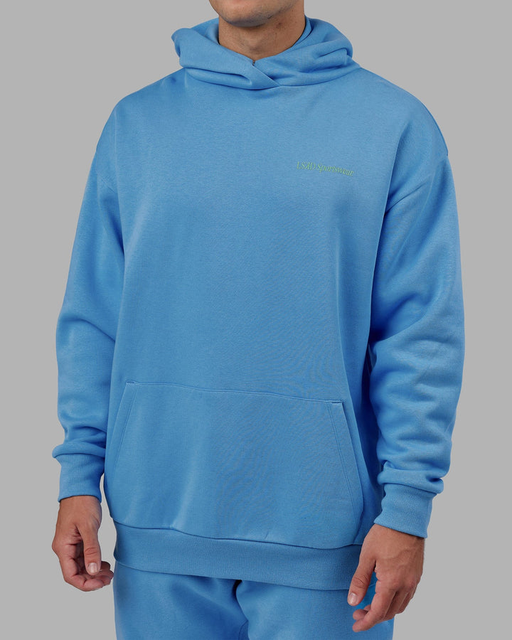 Man wearing Unisex Motion Hoodie Oversize - Azure Blue