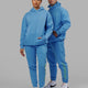 Man and Woman wearing Unisex Motion Hoodie Oversize - Azure Blue