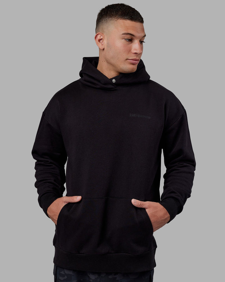 Man wearing Unisex Motion Hoodie Oversize - Black-Black