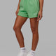 Woman wearing Motion Lounge Shorts - Apple Mint