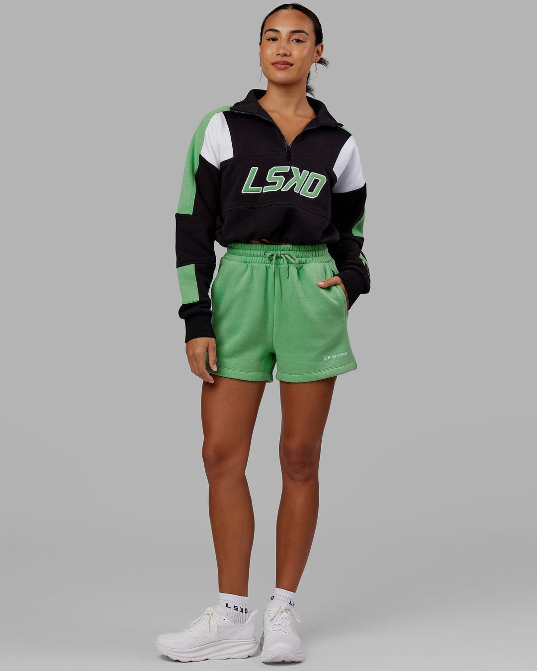 Woman wearing Motion Lounge Shorts - Apple Mint
