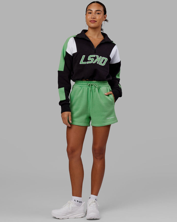 Woman wearing Motion Lounge Shorts - Apple Mint