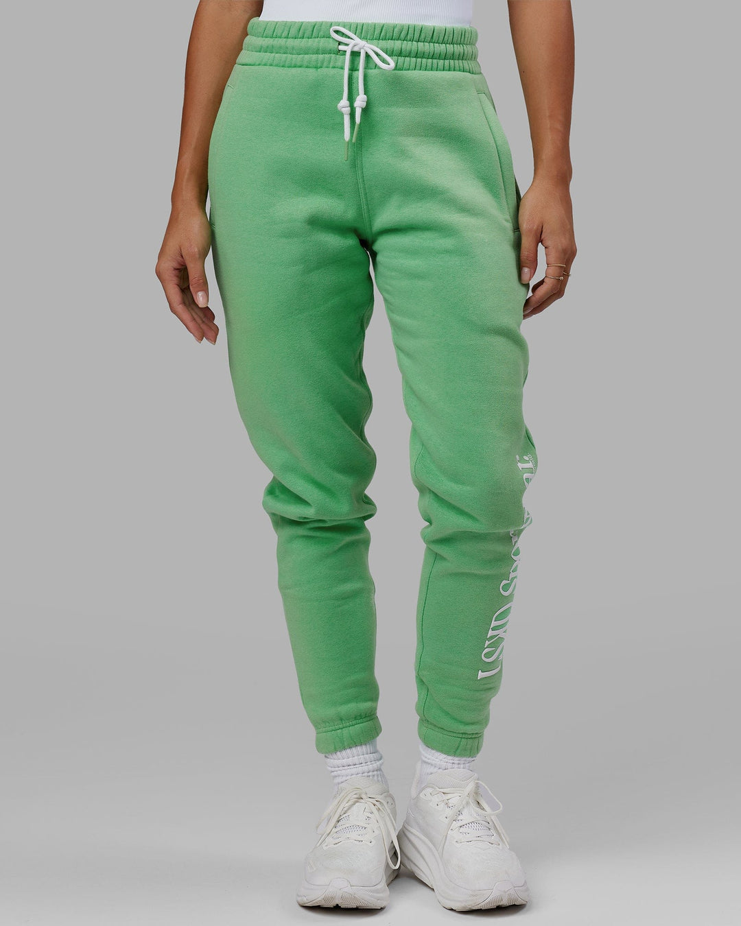 Woman wearing Unisex Motion Trackpant - Apple Mint