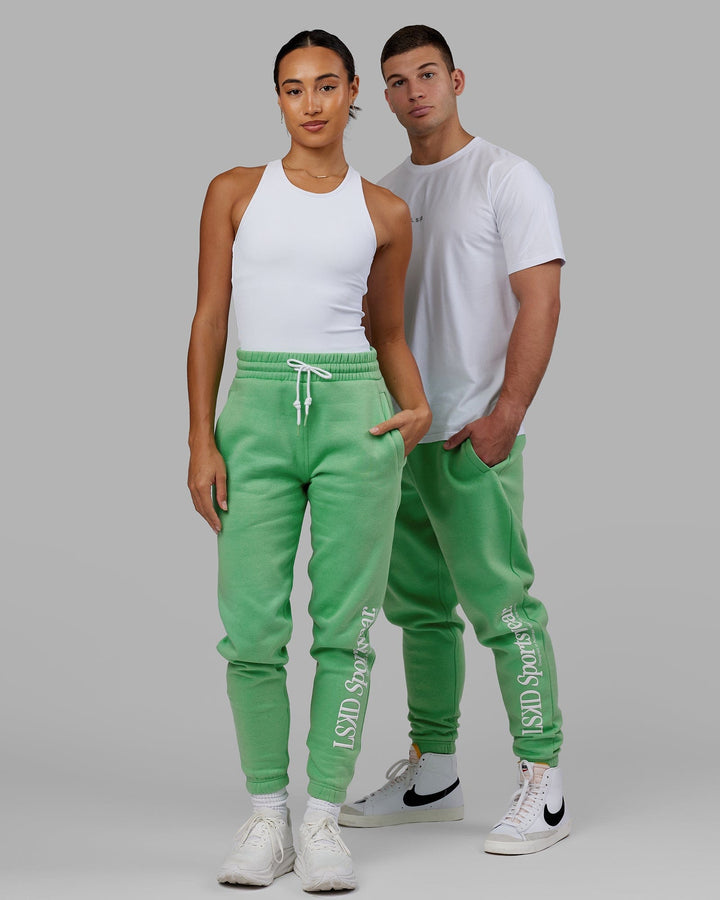 Man and Woman wearing Unisex Motion Trackpant - Apple Mint