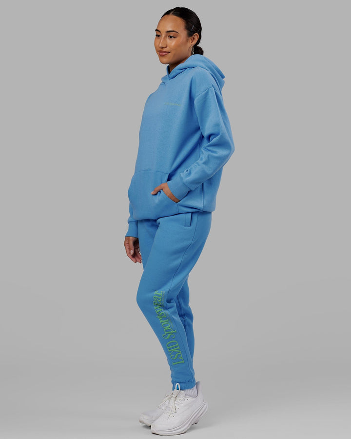 Woman wearing Unisex Motion Trackpant - Azure Blue
