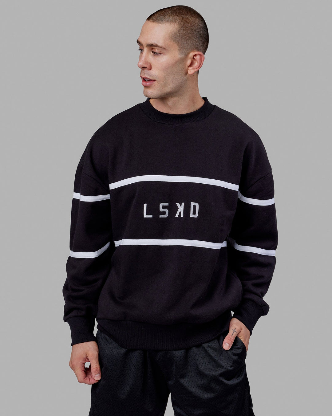 Man wearing Unisex Parallel Sweater Oversize - Black