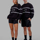 Duo wearing Unisex Parallel Sweater Oversize - Black