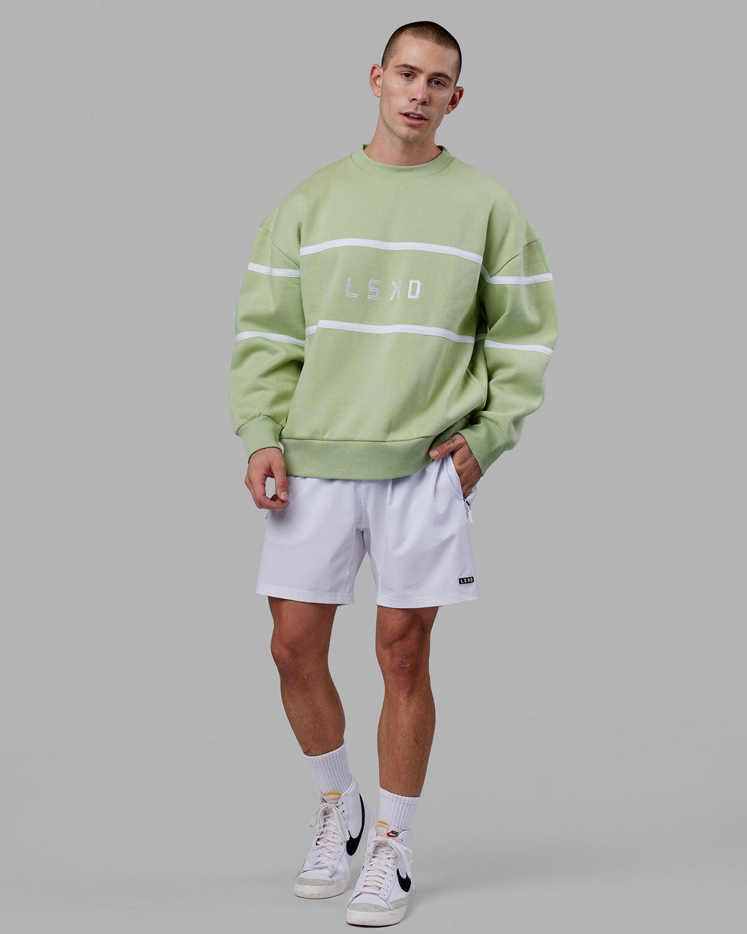 Man wearing Unisex Parallel Sweater Oversize - Green Fig