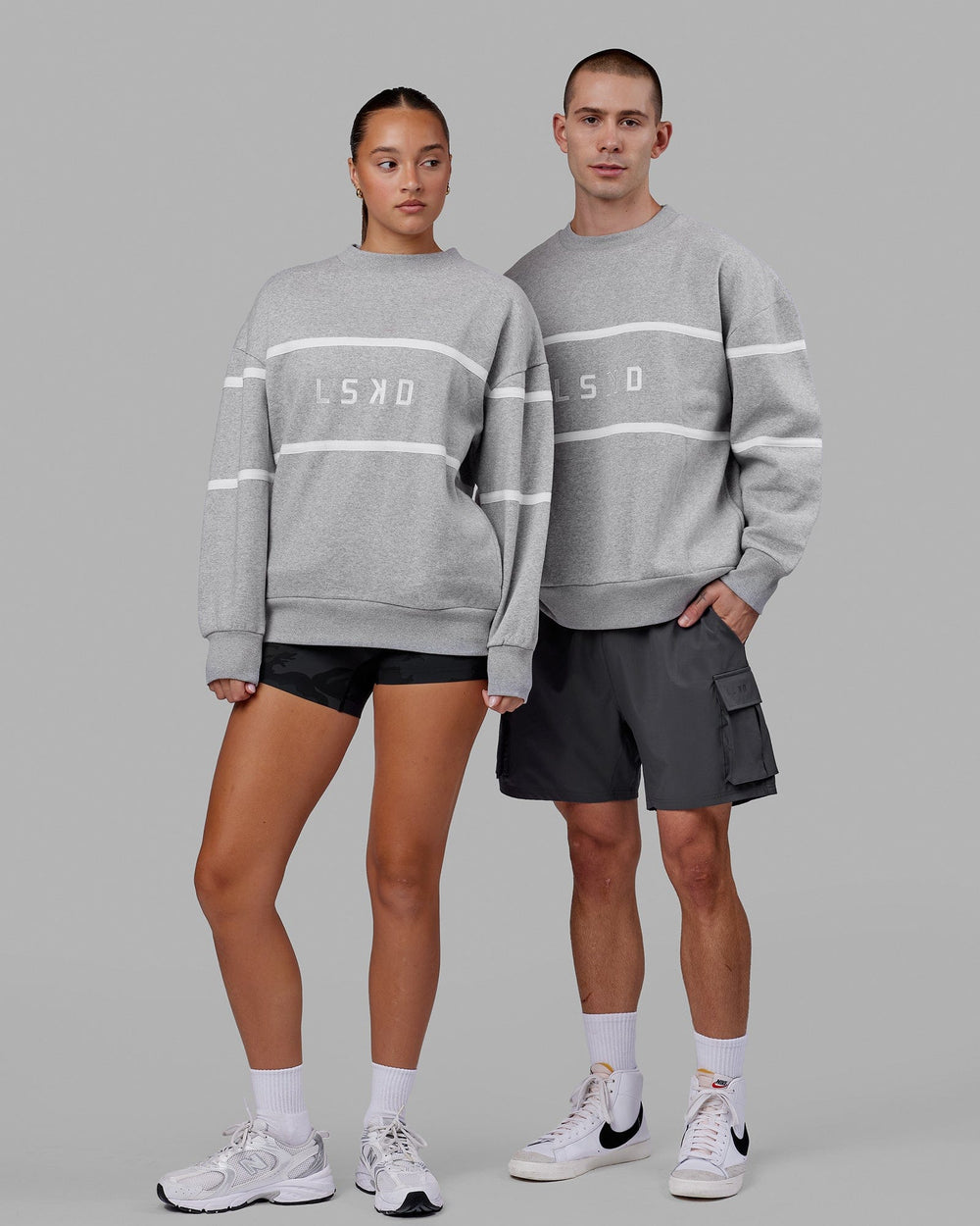 Duo wearing Unisex Parallel Sweater Oversize - Lt Grey Marl