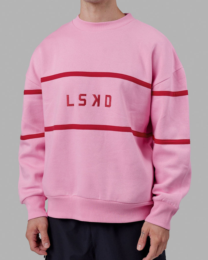 Man wearing Unisex Parallel Sweater Oversize - Pink Frosting