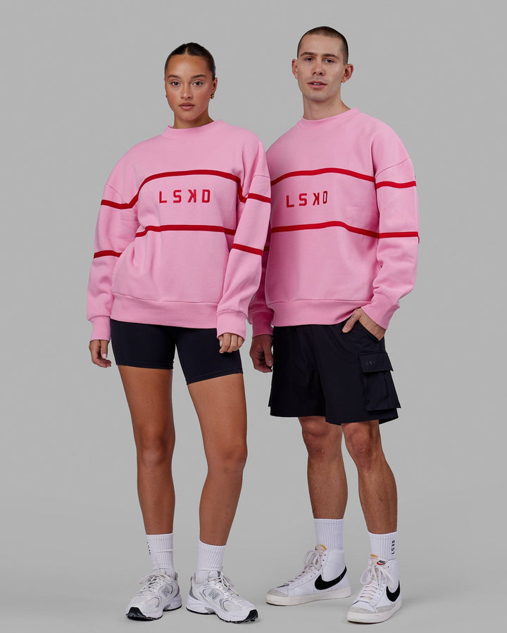 Duo wearing Unisex Parallel Sweater Oversize - Pink Frosting