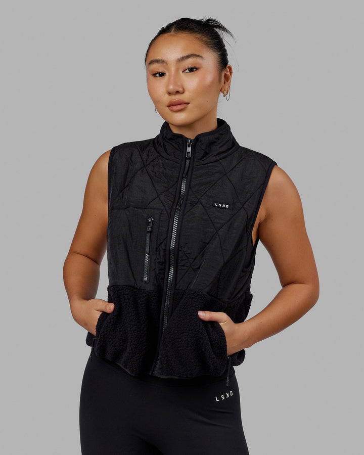 Woman wearing Peak Quilted Vest - Black
