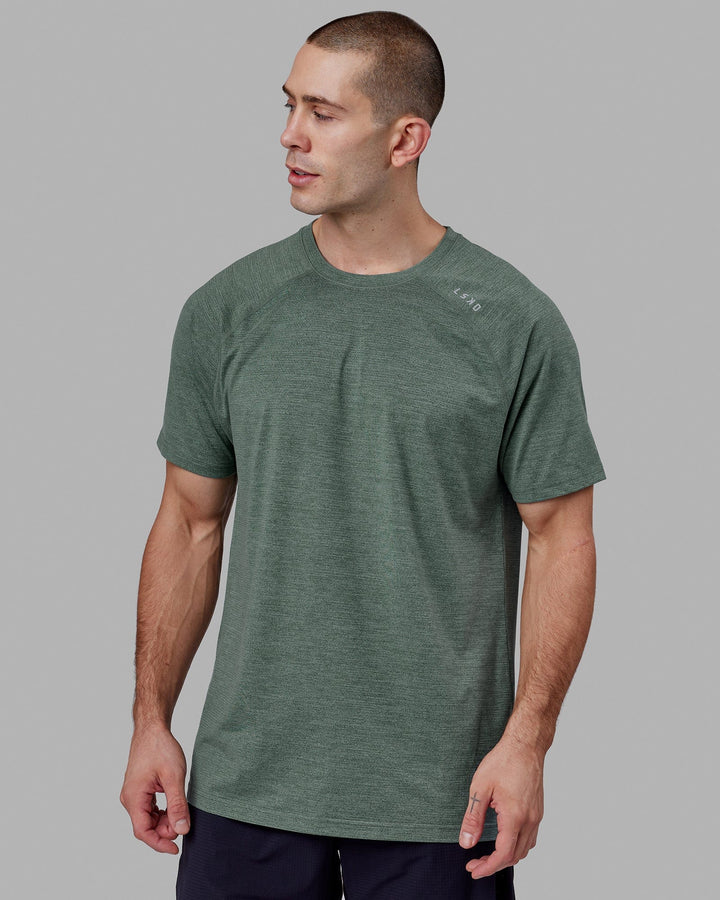 Man wearing Perform VapourFLX Tee - Dark Forest