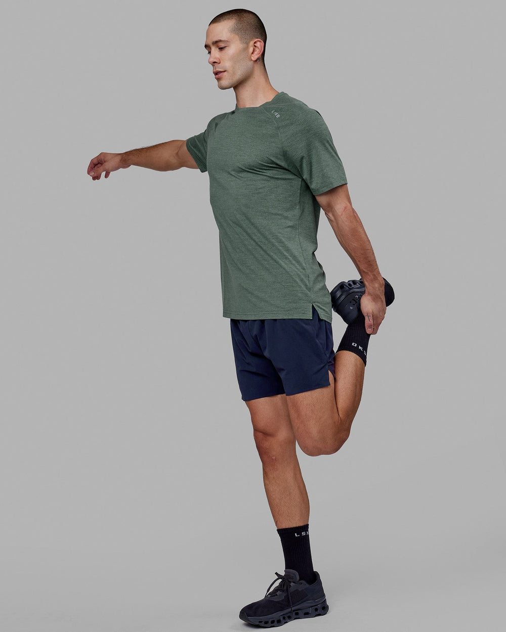 Man wearing Perform VapourFLX Tee - Dark Forest