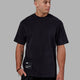 Man wearing R&D Heavyweight Oversize Tee - Black