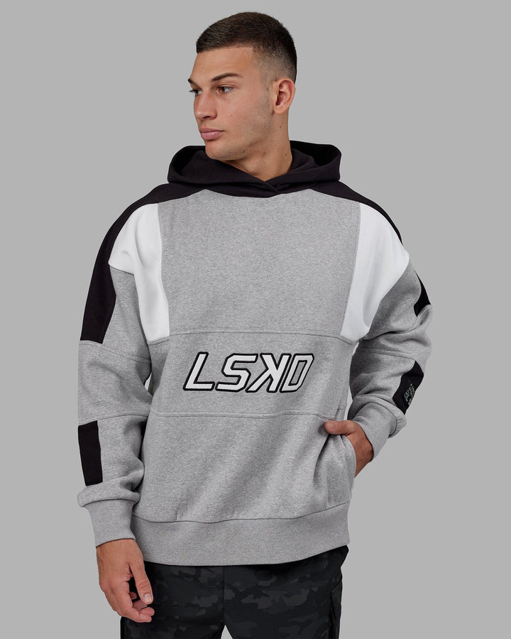 Man wearing Unisex Slam Hoodie Oversize - Lt Grey Marl-Black