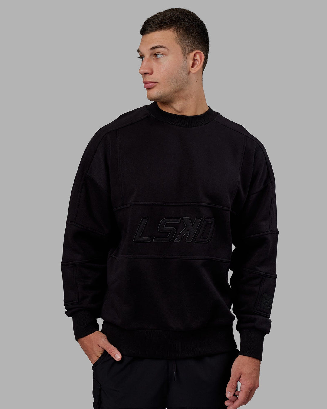 Man wearing Unisex Slam Sweater Oversize - Black-Black
