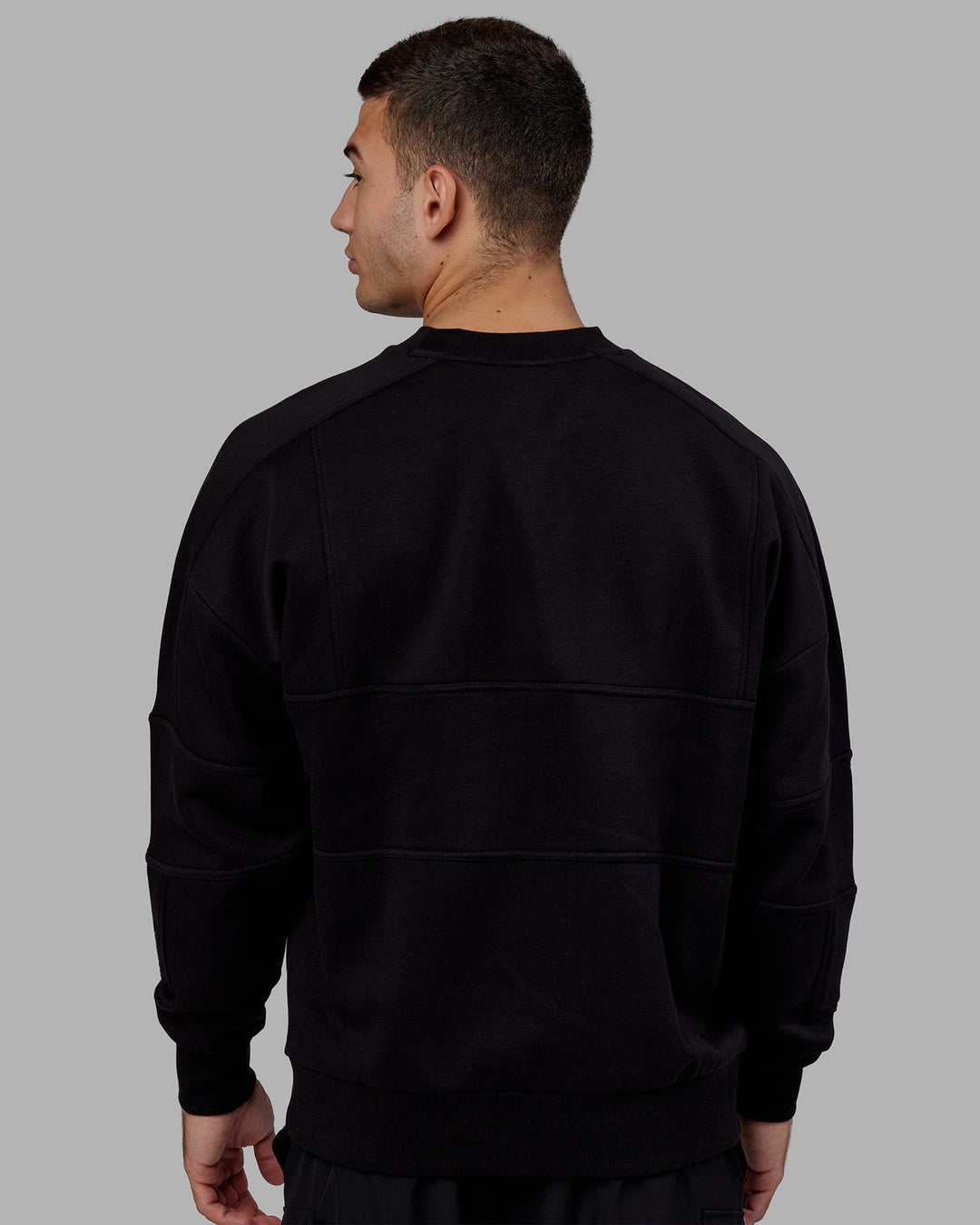 Man wearing Unisex Slam Sweater Oversize - Black-Black