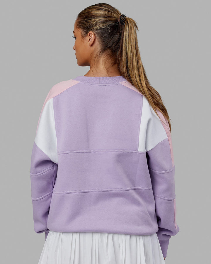 Woman wearing Unisex Slam Sweater Oversize - Pale Lilac-Petal Pink