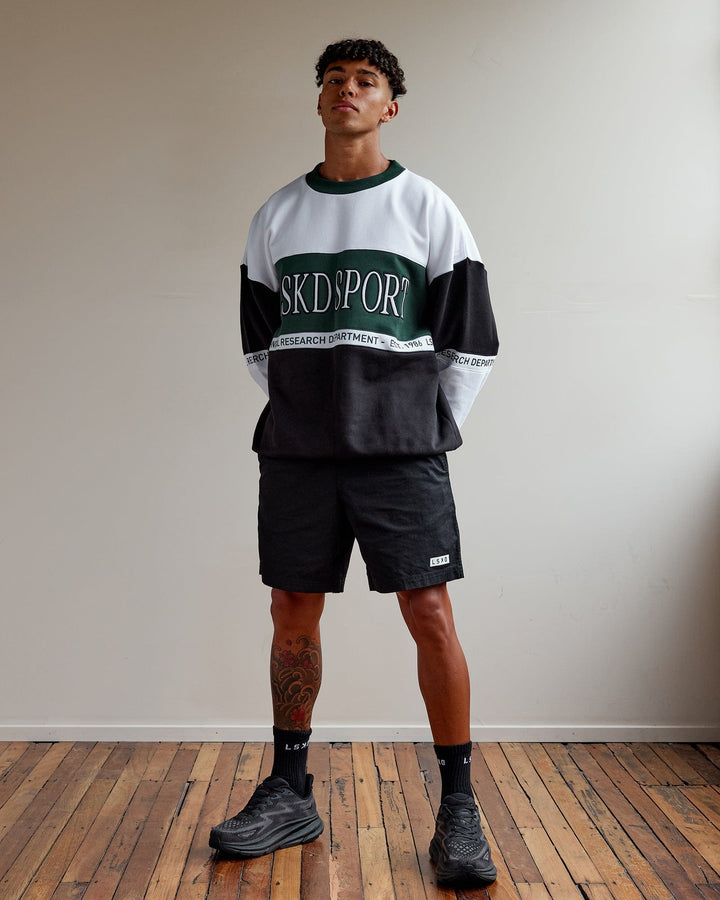 Man wearing Unisex Sportif Sweater Oversize - Vital Green-Multi