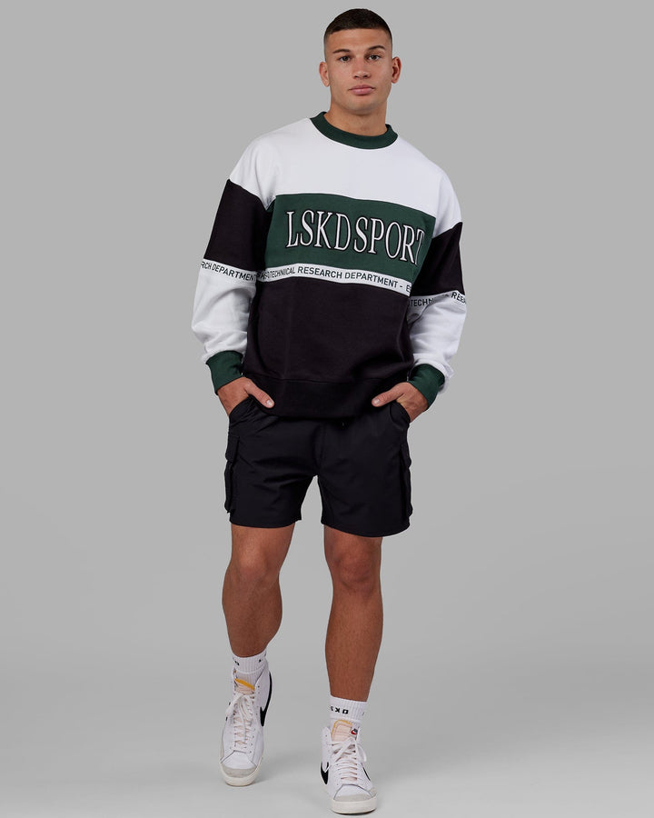 Man wearing Unisex Sportif Sweater Oversize - Vital Green-Multi