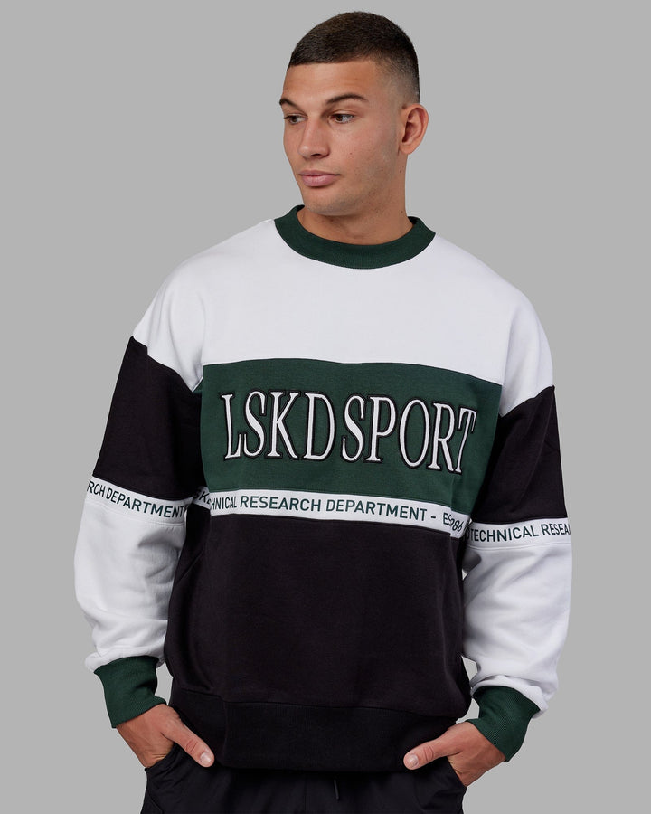 Man wearing Unisex Sportif Sweater Oversize - Vital Green-Multi