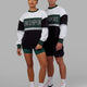 Man and Woman wearing Unisex Sportif Sweater Oversize - Vital Green-Multi