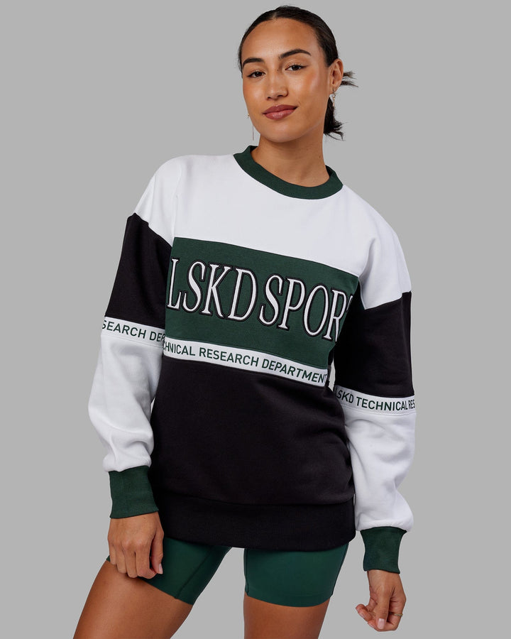 Woman wearing Unisex Sportif Sweater Oversize - Vital Green-Multi