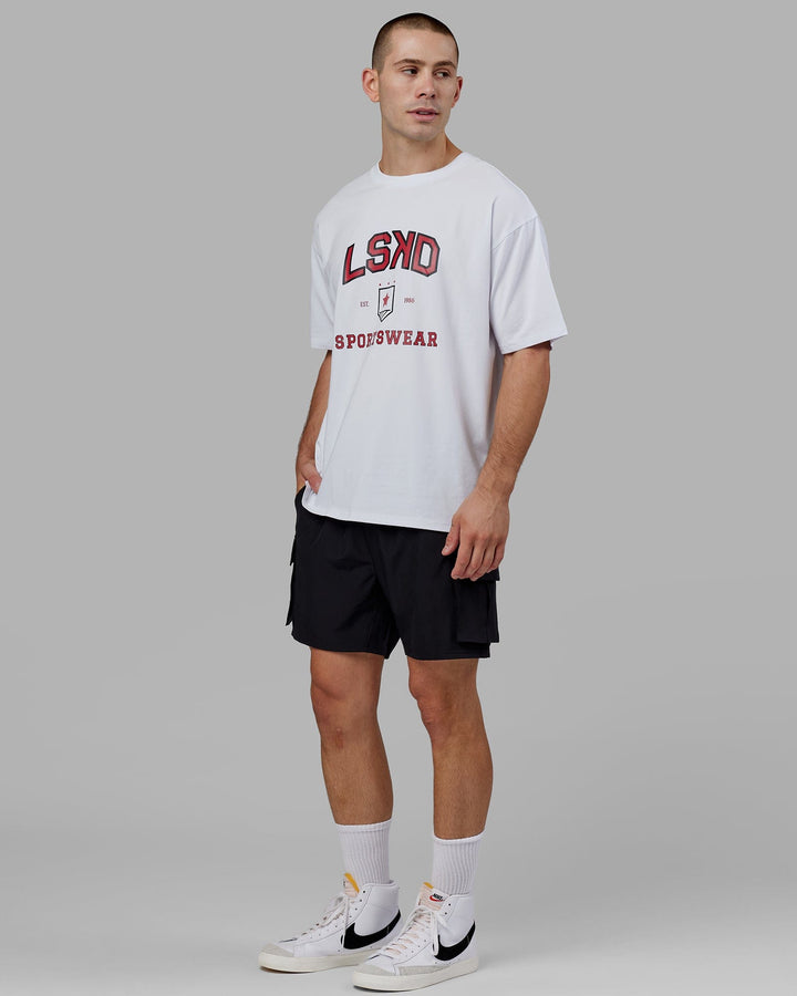 Man wearing Unisex Sports Dept. Tee Oversize - White-Red