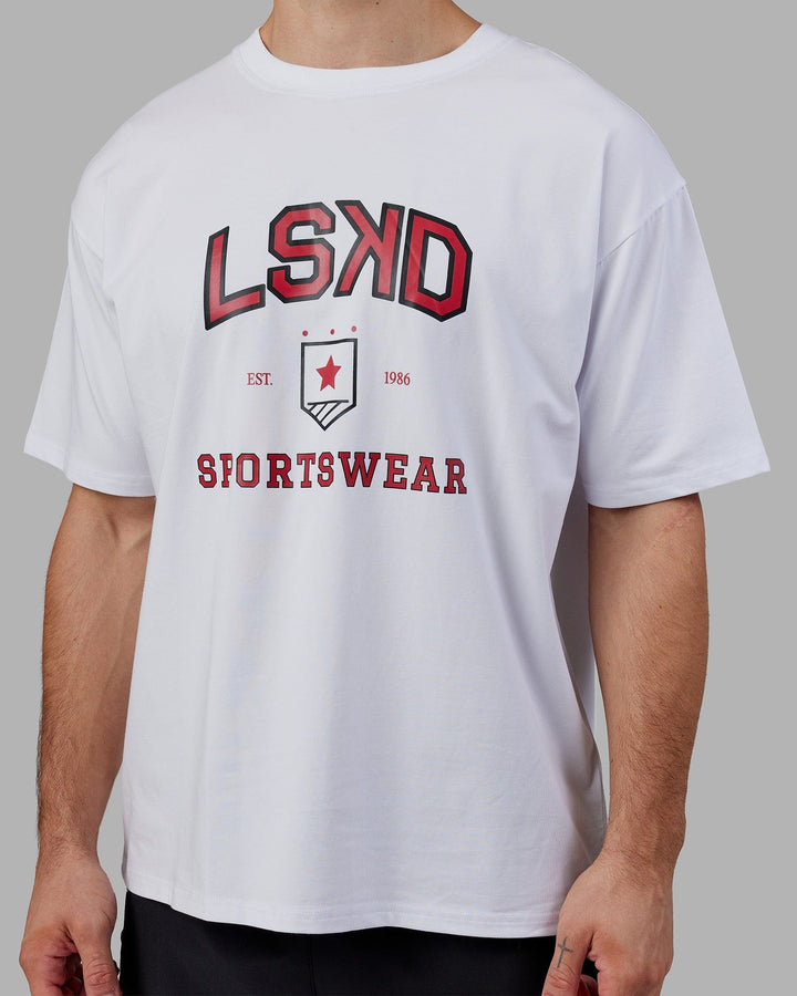 Man wearing Unisex Sports Dept. Tee Oversize - White-Red