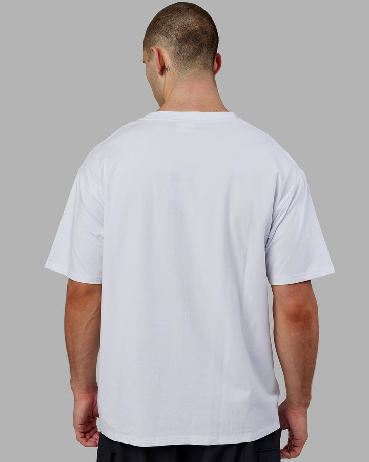 Man wearing Unisex Sports Dept. Tee Oversize - White-Red