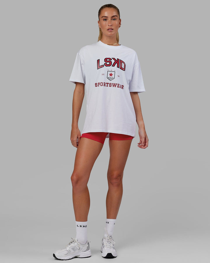 Woman wearing Unisex Sports Dept. Tee Oversize - White-Red