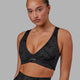 Woman wearing Stamina Bra - Black-Tie-Dye