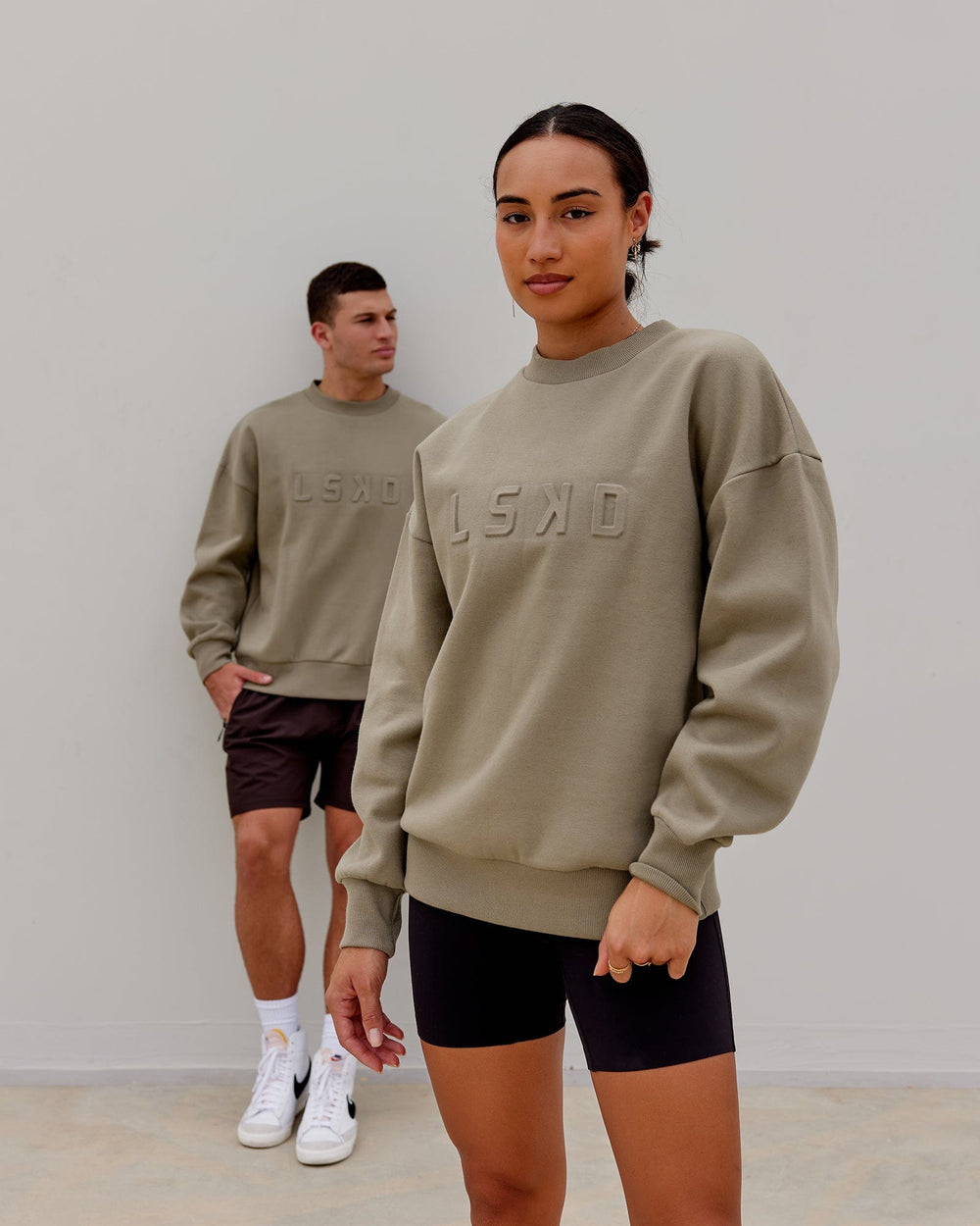 Duo wearing Unisex Stamped Sweater Oversize - Laurel Oak