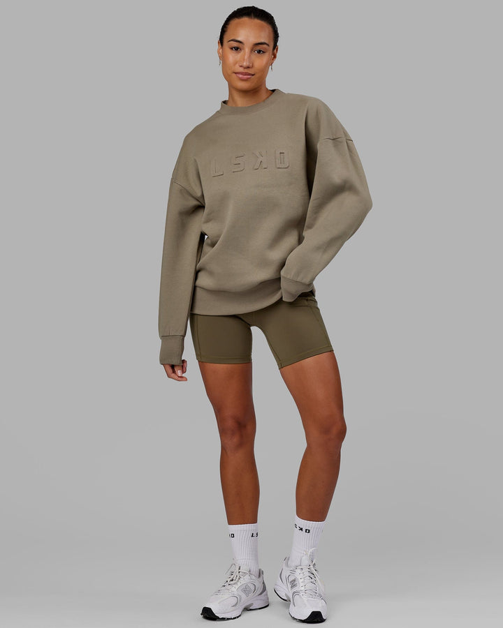 Woman wearing Unisex Stamped Sweater Oversize - Laurel Oak
