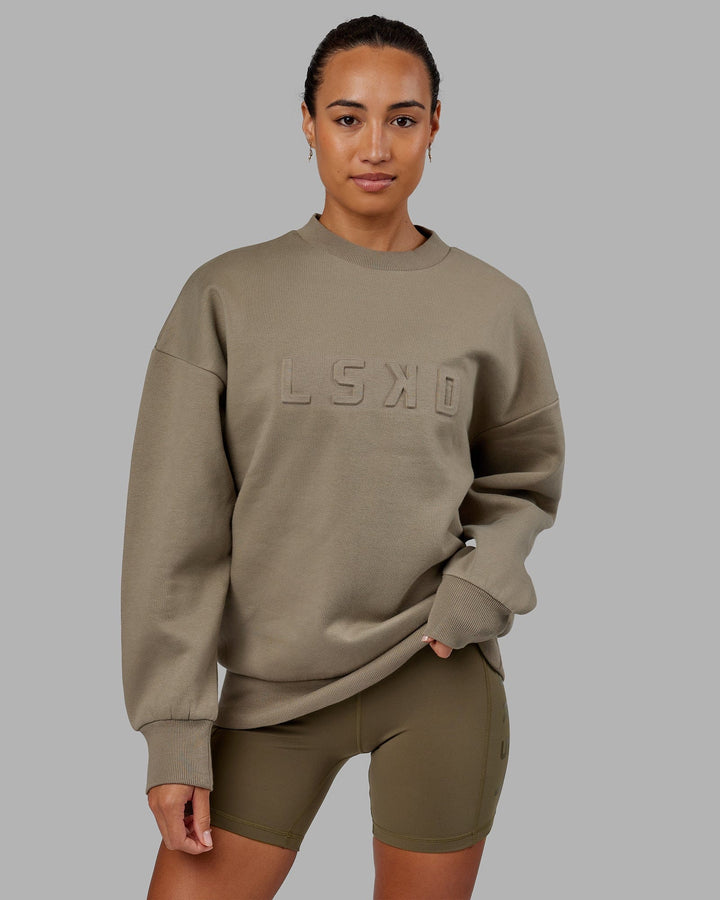 Woman wearing Unisex Stamped Sweater Oversize - Laurel Oak