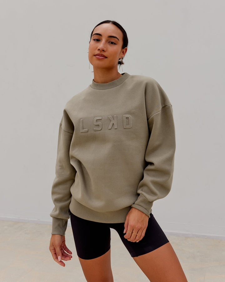 Woman wearing Unisex Stamped Sweater Oversize - Laurel Oak