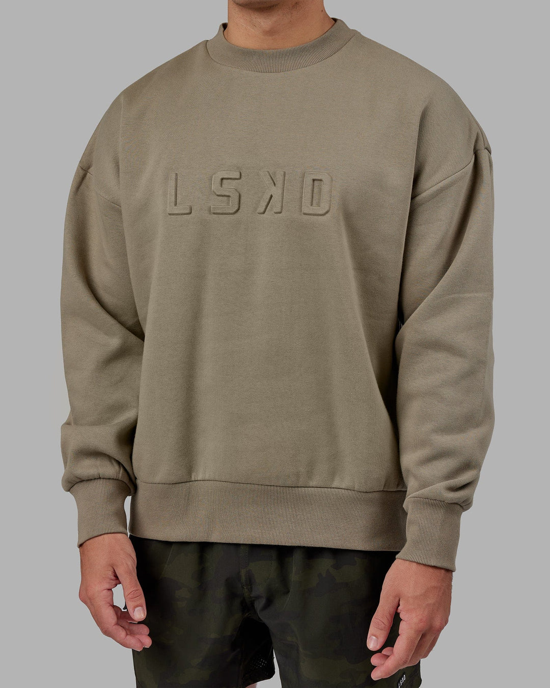 Man wearing Unisex Stamped Sweater Oversize - Laurel Oak