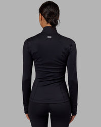 Woman wearing Stride Zip Through Jacket - Black | Thumbnail Index: 3