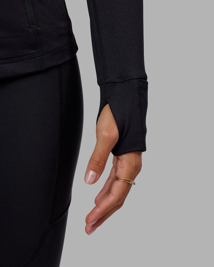Woman wearing Stride Zip Through Jacket - Black