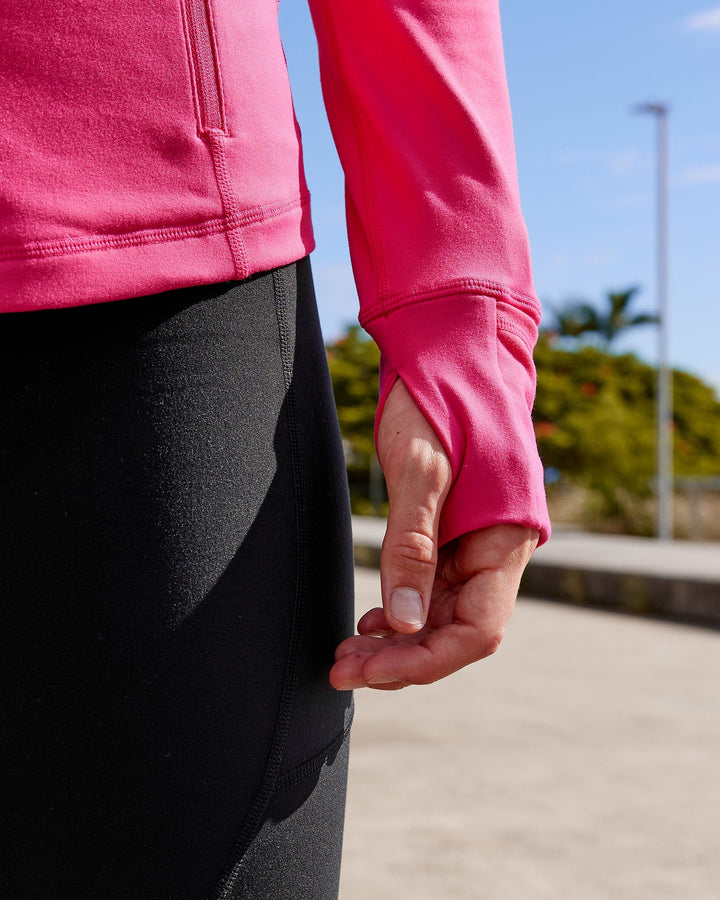 Woman wearing Stride Zip Through Jacket - Boysenberry