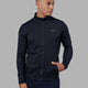 Man wearing Stride Zip Through Performance Jacket - Navy