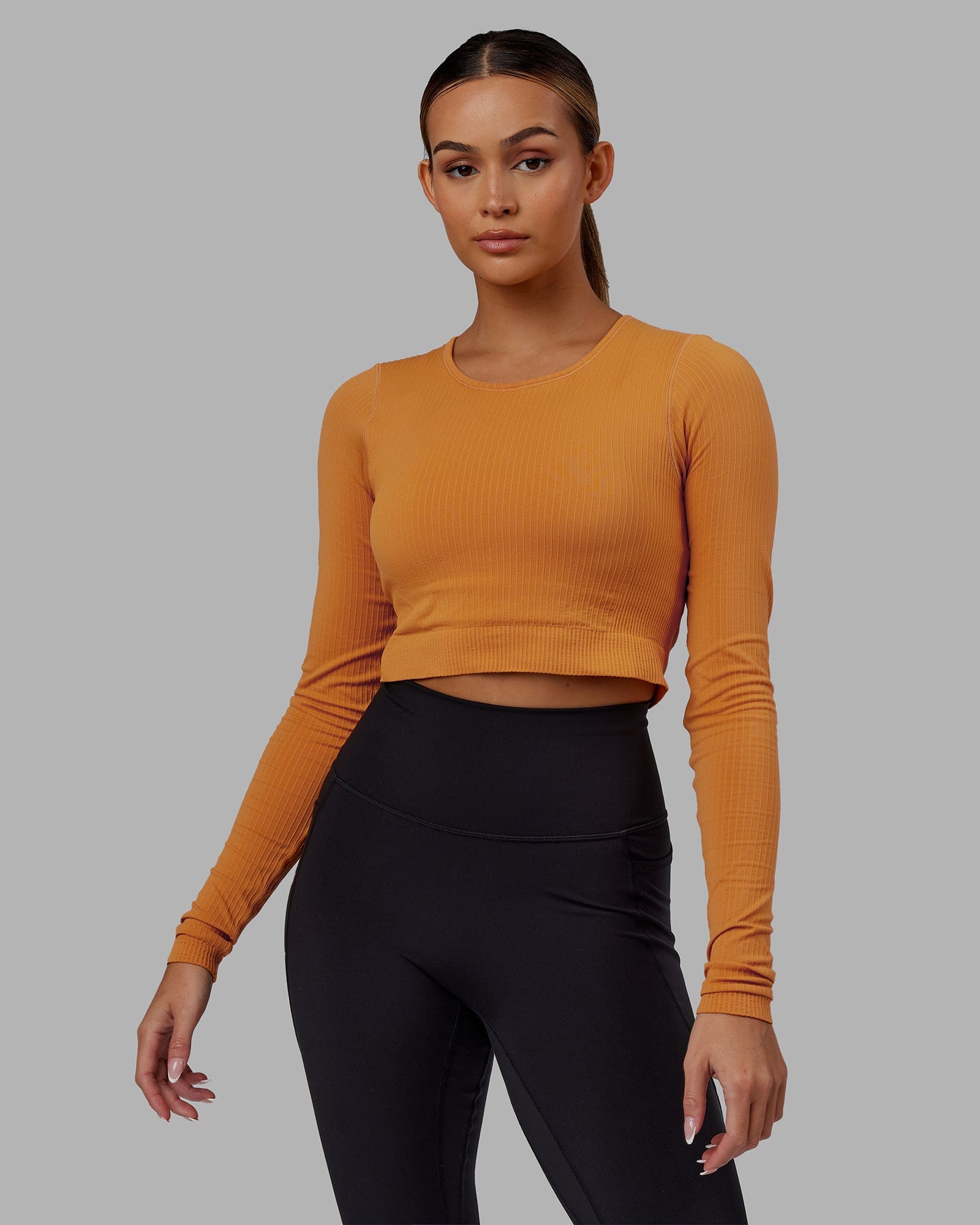 Woman wearing Ultra Soft Seamless Long Sleeve Top - Sundial